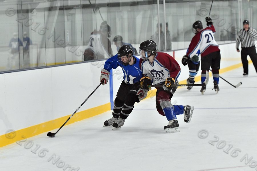 Wheaton College Men\'s Ice Hockey vs Middlesex Community College. - Photo By: KEITH NORDSTROM